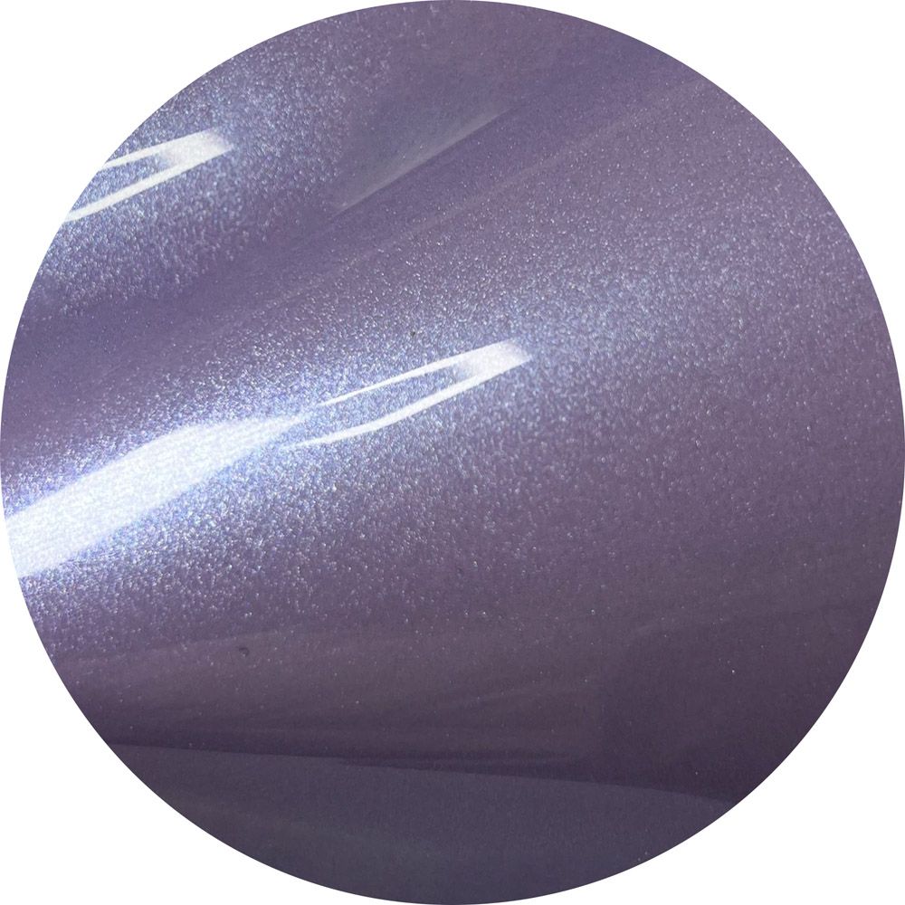 A close up of a purple circle on a white background