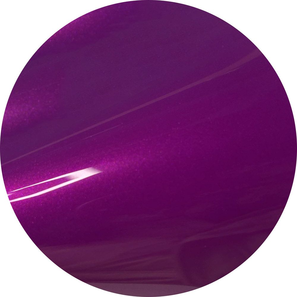 A close up of a purple circle on a white background