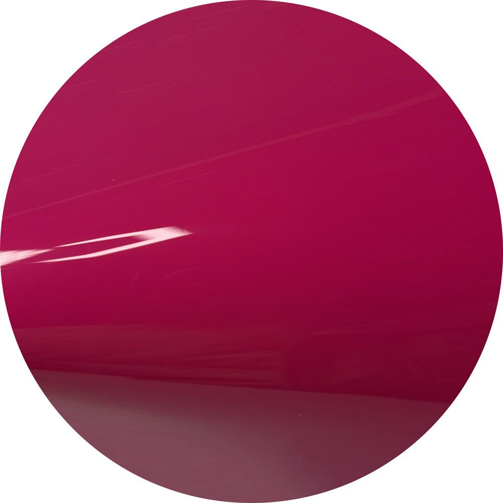 A close up of a pink circle on a white background