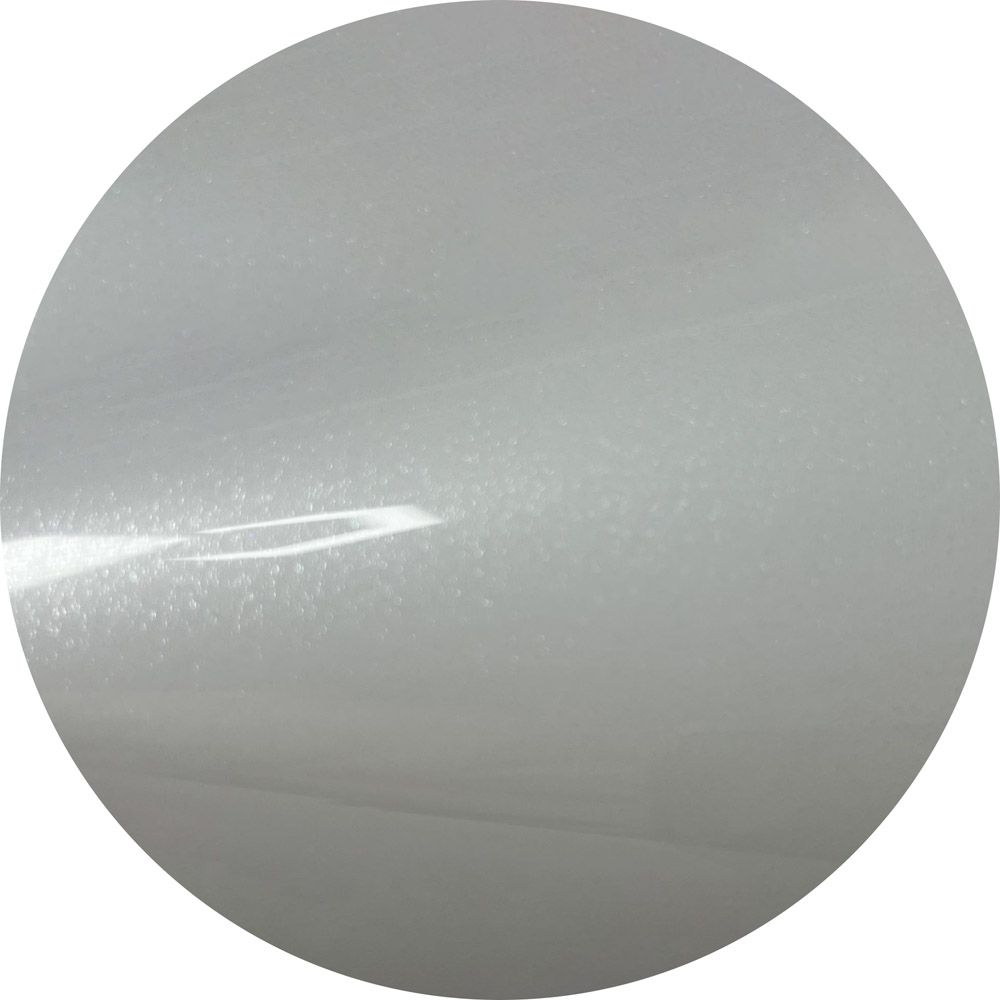 A close up of a white circle on a white background