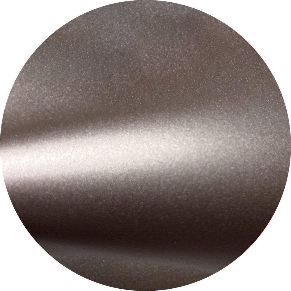 A close up of a metal surface in a circle