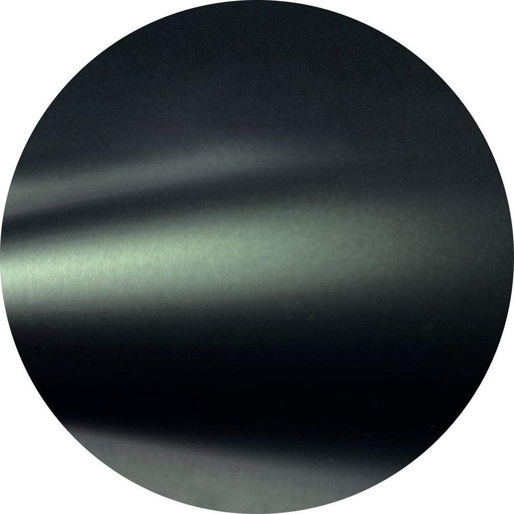 A close up of a black circle on a white background