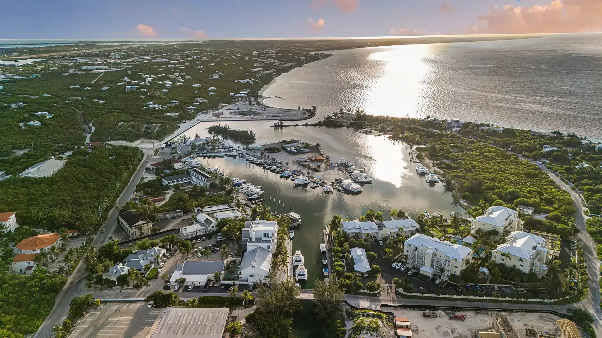 An aerial view of a marina with boats in it