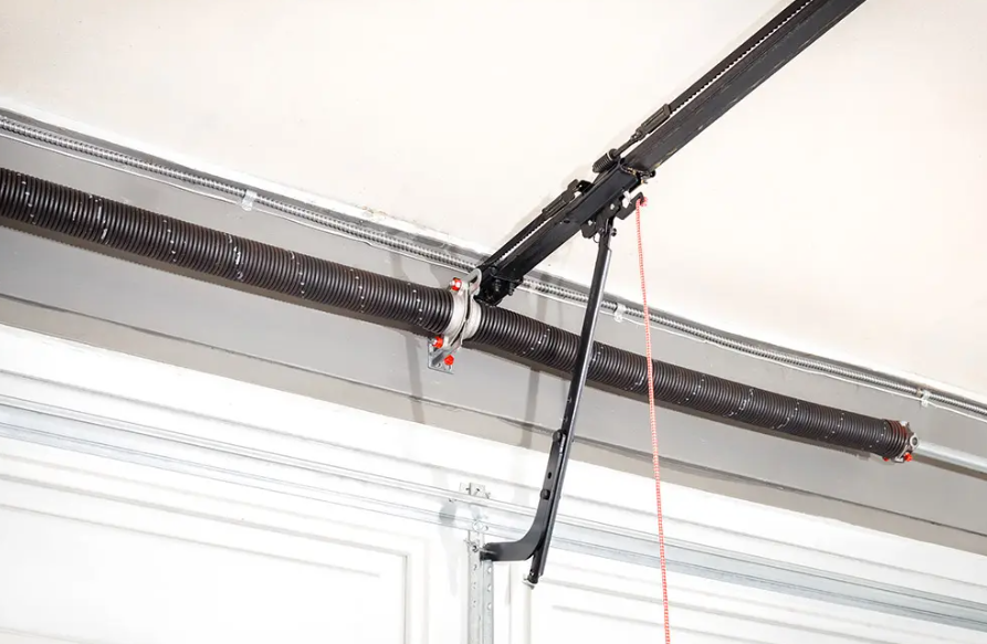 Garage door opener rail and hanging cord mounted on the ceiling