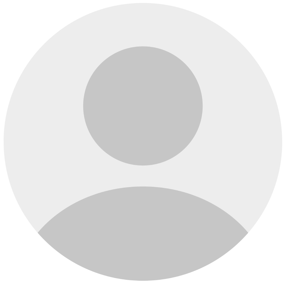 Gray silhouette of a person in a circle; depicting a placeholder or default profile picture.