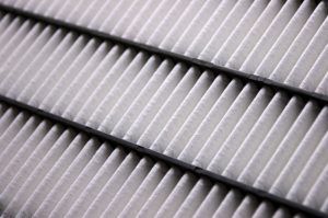 A close up of a air filter on a car.