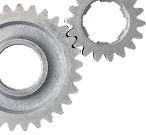 Two metal gears interlocked, silver color, for mechanical motion.