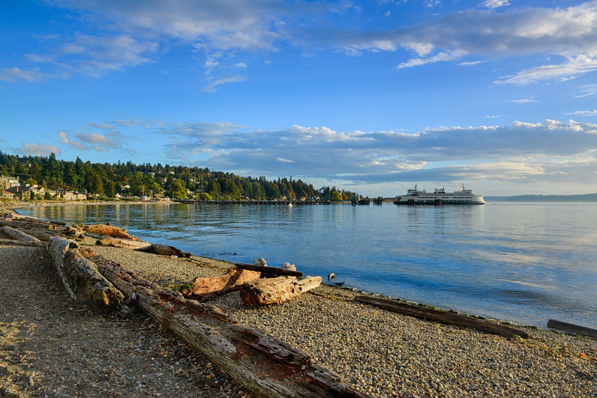 A large body of water with a boat in the distance.