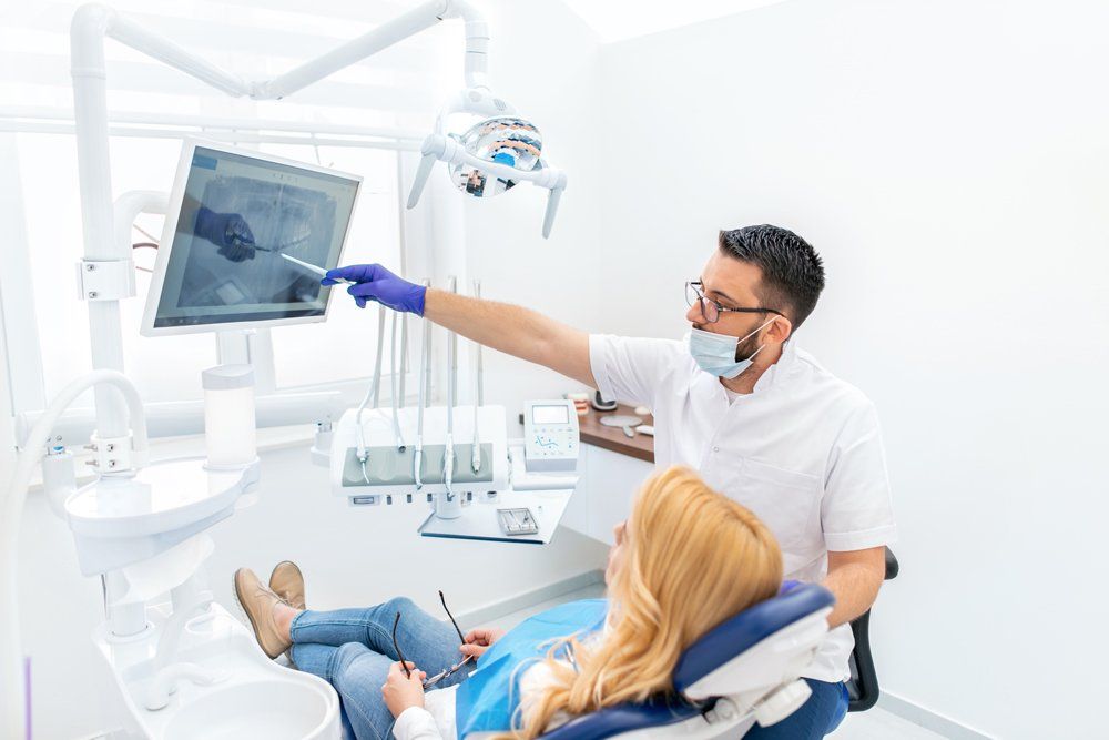 Dentist Explaining Tooth X-Rays — Kamuela, HI — Brian S Kubo, DDS, Inc.