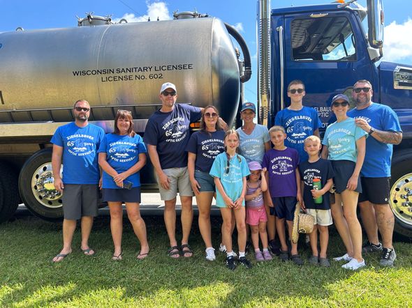 Septic Service Staff Beside their Blue Truck — Malone, WI — Ziegelbauer Septic Service LLC