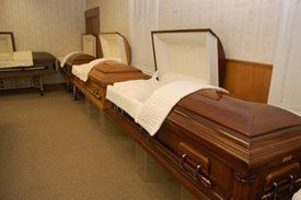 Wooden Casket — Oklahoma City, OK — Demuth Funeral Home and Cremation Society™