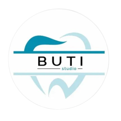 Logo per Buti Studio: uno studio dentistico con il contorno di un dente, dettagli color verde acqua e il nome 