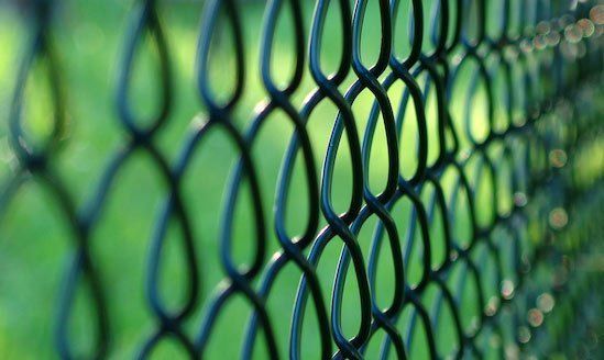 Close Up on Black Chain Link Fence — Indianapolis, IN — Duke Fence Co., Inc.