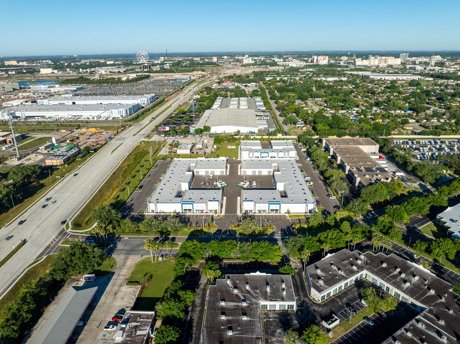 An aerial view of a city with a lot of buildings and trees.