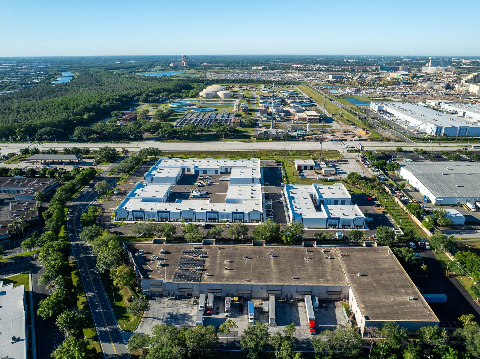 An aerial view of a large building in the middle of a city.