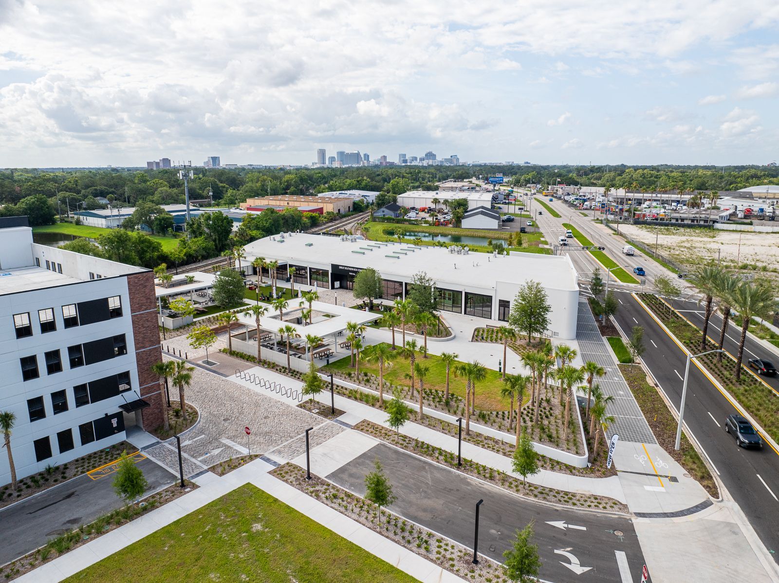 An aerial view of a city with a lot of buildings and trees.