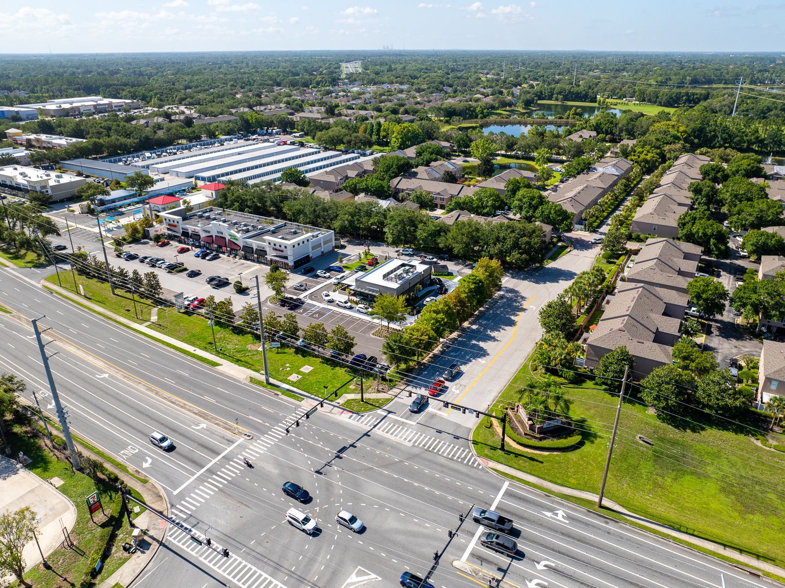 An aerial view of a busy intersection in a residential area.