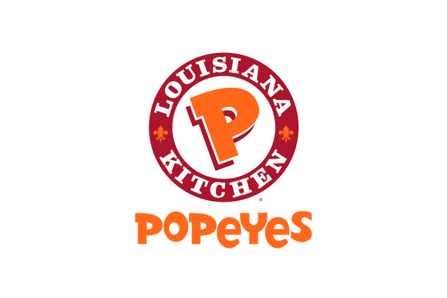 A logo for louisiana kitchen popeyes on a white background