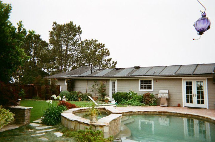 House with a swimming pool and solar panels — San Diego, CA — Mark Naylor Solar Specialists