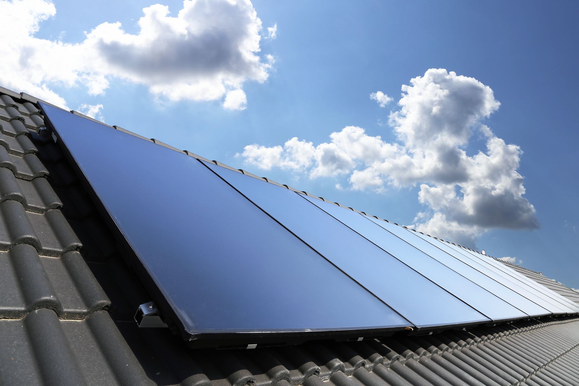 Solar panels on a roof | Pool Solar System Maintenance Carlsbad CA | Mark Naylor Solar Specialists