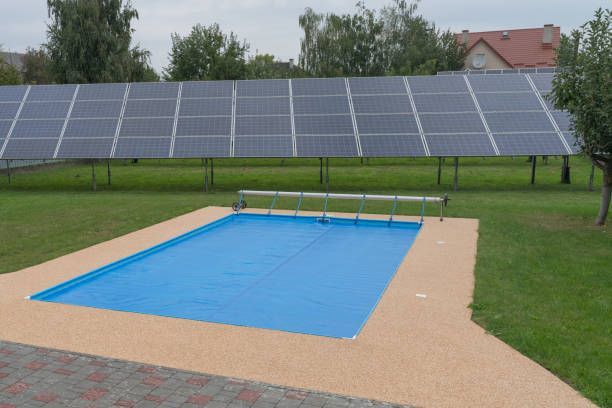 A covered swimming pool with a pool solar system.