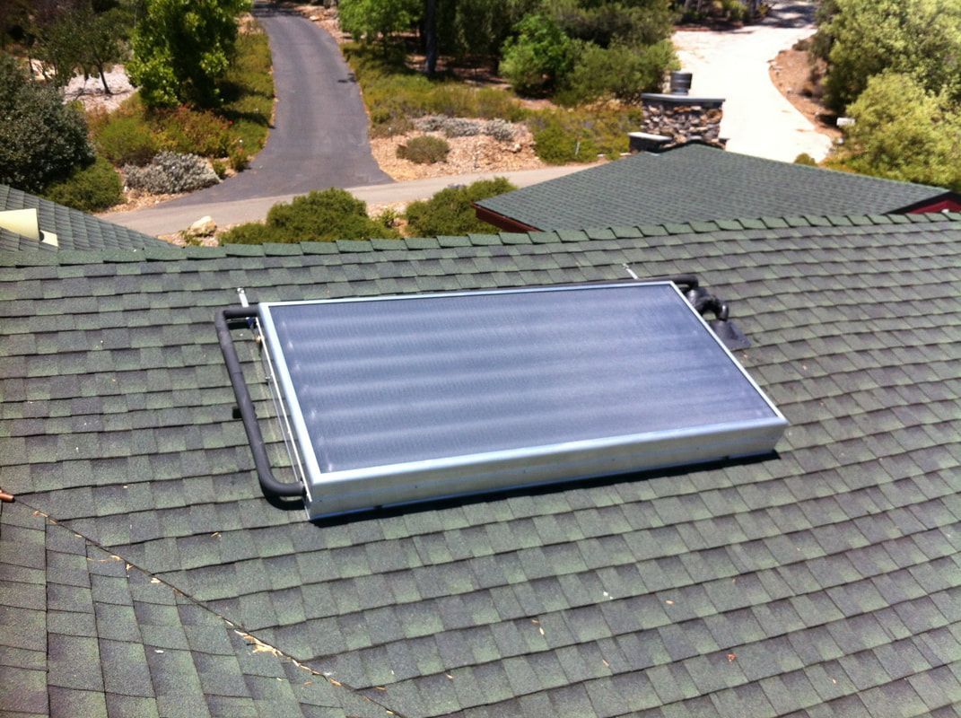 A solar panel is on the roof of a house — San Diego, CA — Mark Naylor Solar Specialists