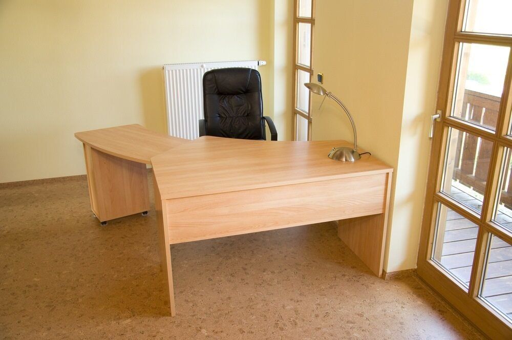 Light Wood Office Desk and Black Chair — Gava Floor Centre In Goonellabah, NSW