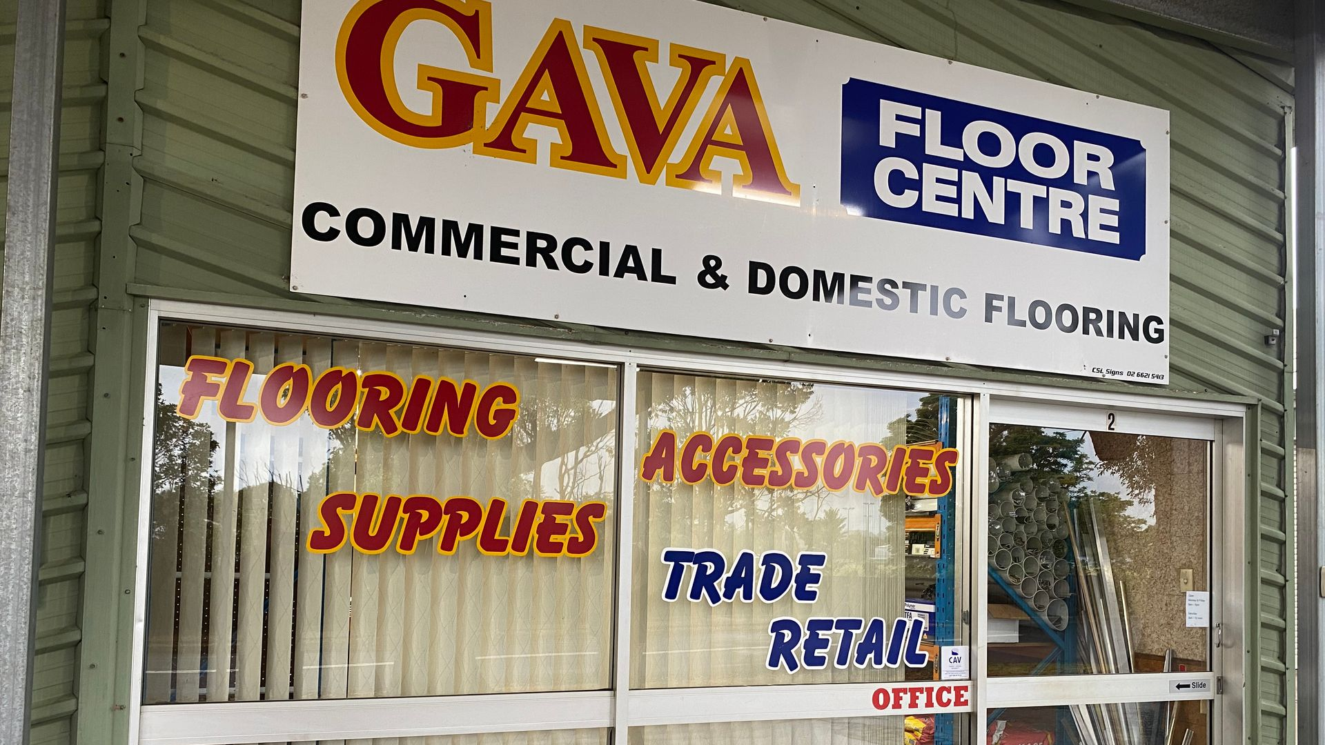 Gava Floor Centre storefront with signs for flooring, supplies, and accessories.