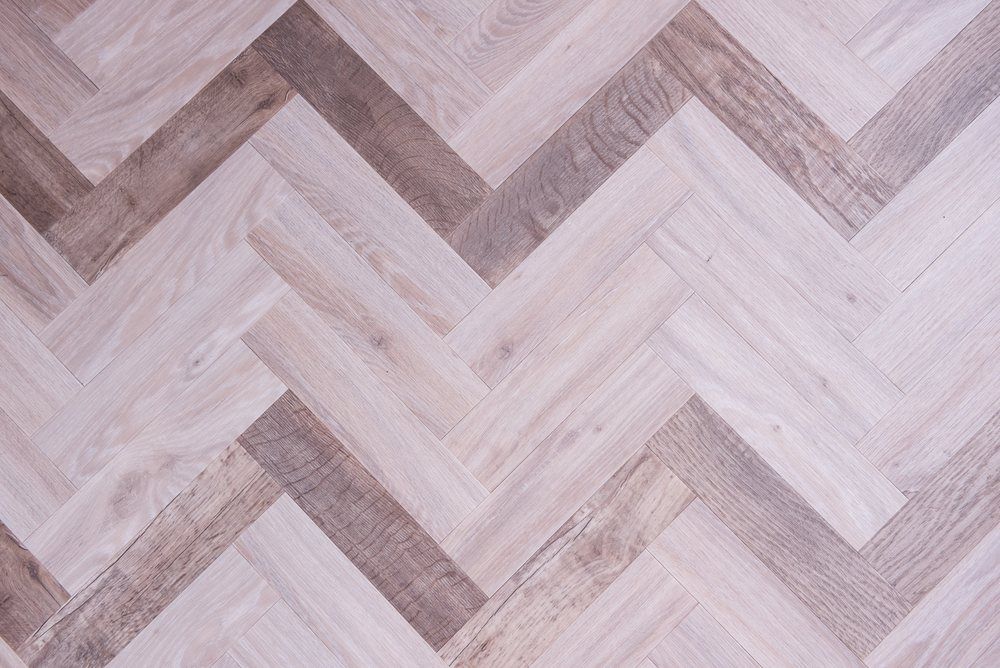 Herringbone Wood Flooring Pattern in Light and Medium Brown Tones — Gava Floor Centre in Casino, NSW