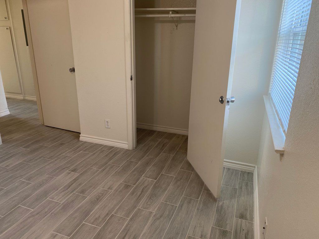 There is a closet in the middle of the room.