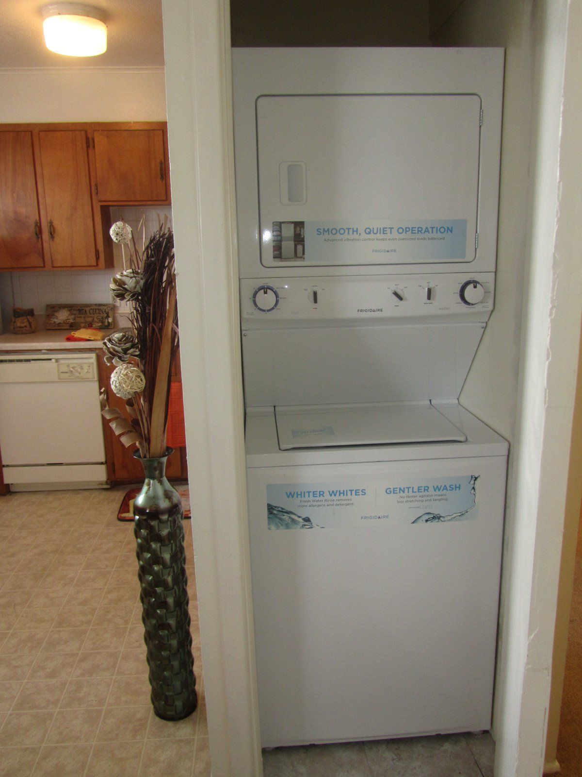 image of stacked washer/dryer in apartment
