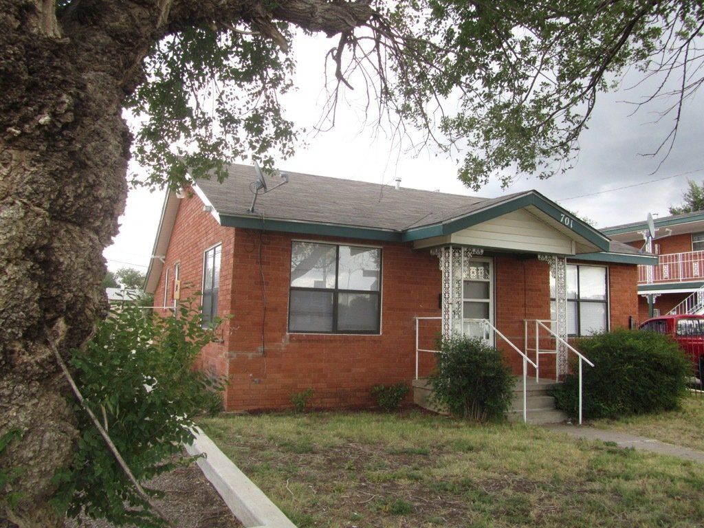 Image of apartment from the exterior red brick, at Bel-Air/Fairway Apartments