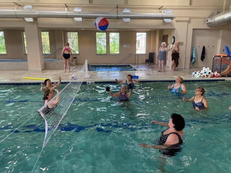 Residents enjoying the Aquatic Center at Wesley Willows in Rockford, IL