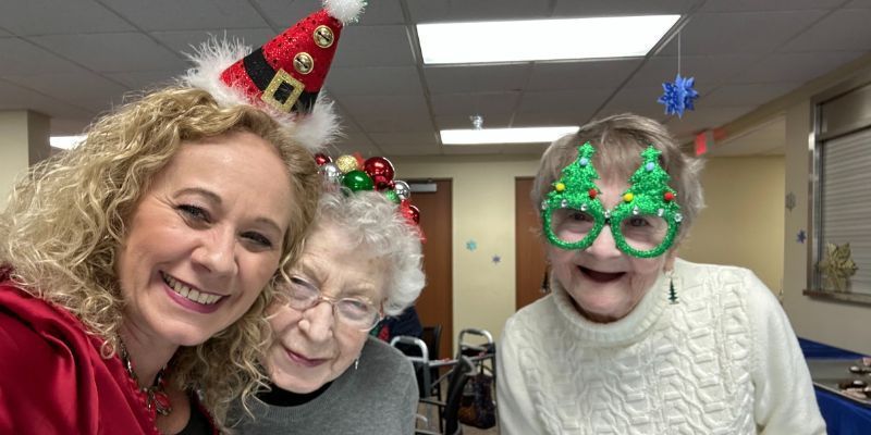 Employee Christmas Fund at Wesley Willows Wesley Willows staff member and residents celebrate Christmas