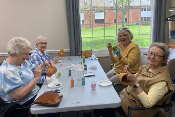 Residents participating in a craft at Peterson Meadows