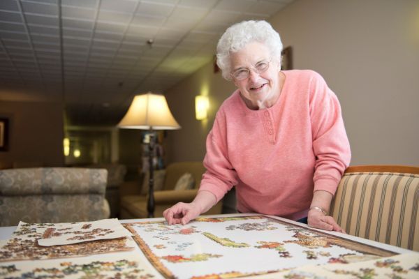 A resident works on a puzzle at Peterson Meadow