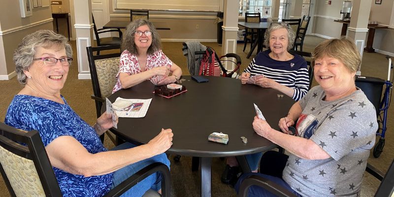 Seniors enjoying a card game at Peterson Meadows in Rockford, IL