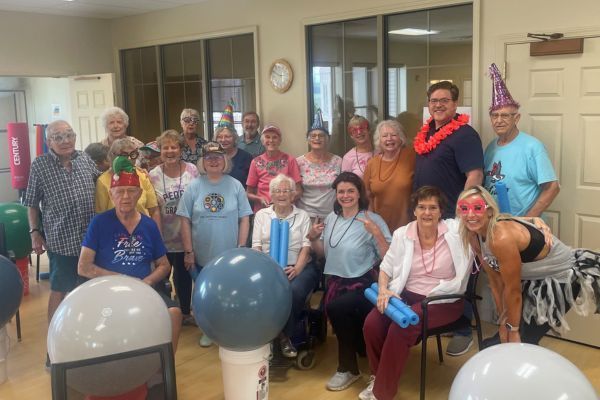 Seniors celebrating a birthday party at Wesley Willows