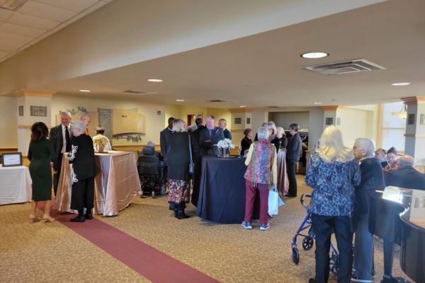 Guests mingling before the Robert Ash Legacy Society Dinner