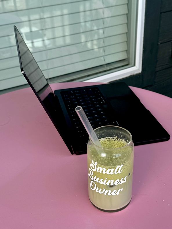 a laptop and matcha outside
