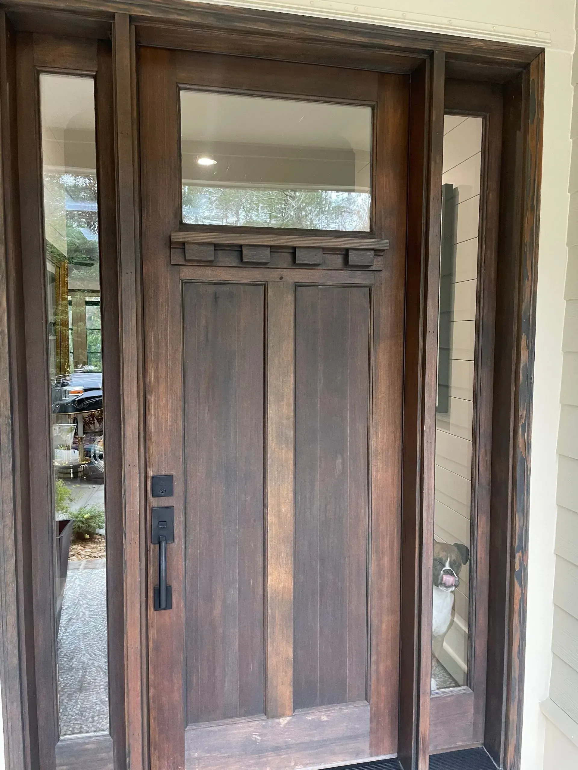 A living room with two couches, a coffee table, and a built-in bookshelf.