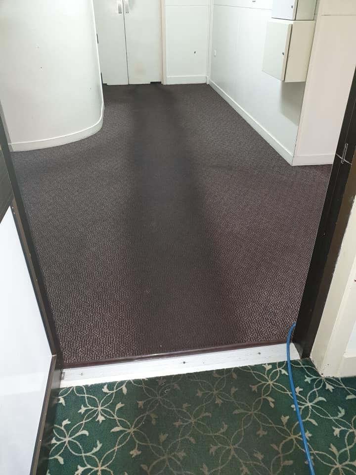 Flood Damaged Carpet Prior to Cleaning — Magic Mist Carpet Cleaning in Norman Gardens, QLD