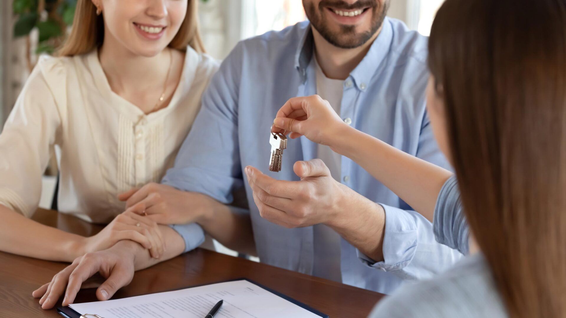 Landlord Handing Keys To Tenant — Royal Oak, MI — Melder & Melder, P.C.