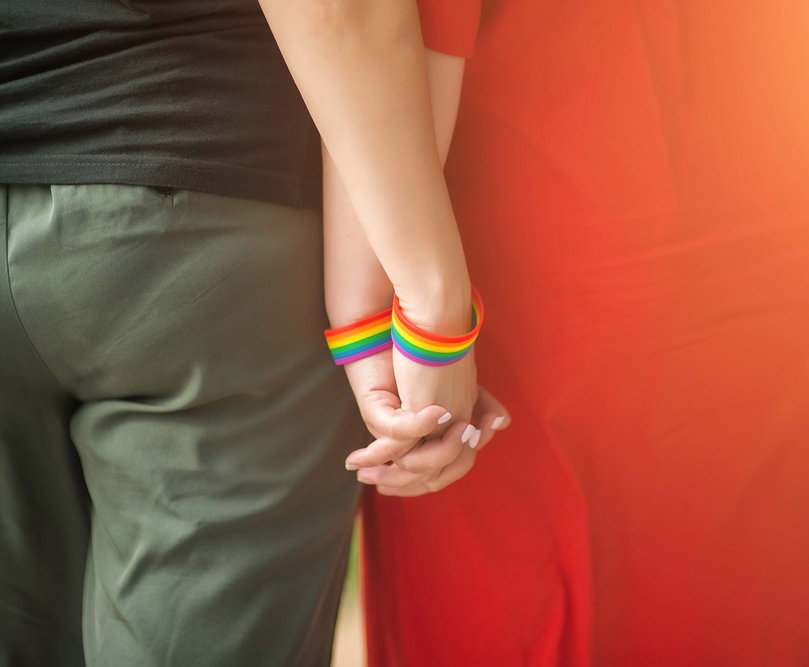LGBT Women Holding Together With Rainbow Ribbon — Royal Oak, MI — Melder & Melder, P.C.