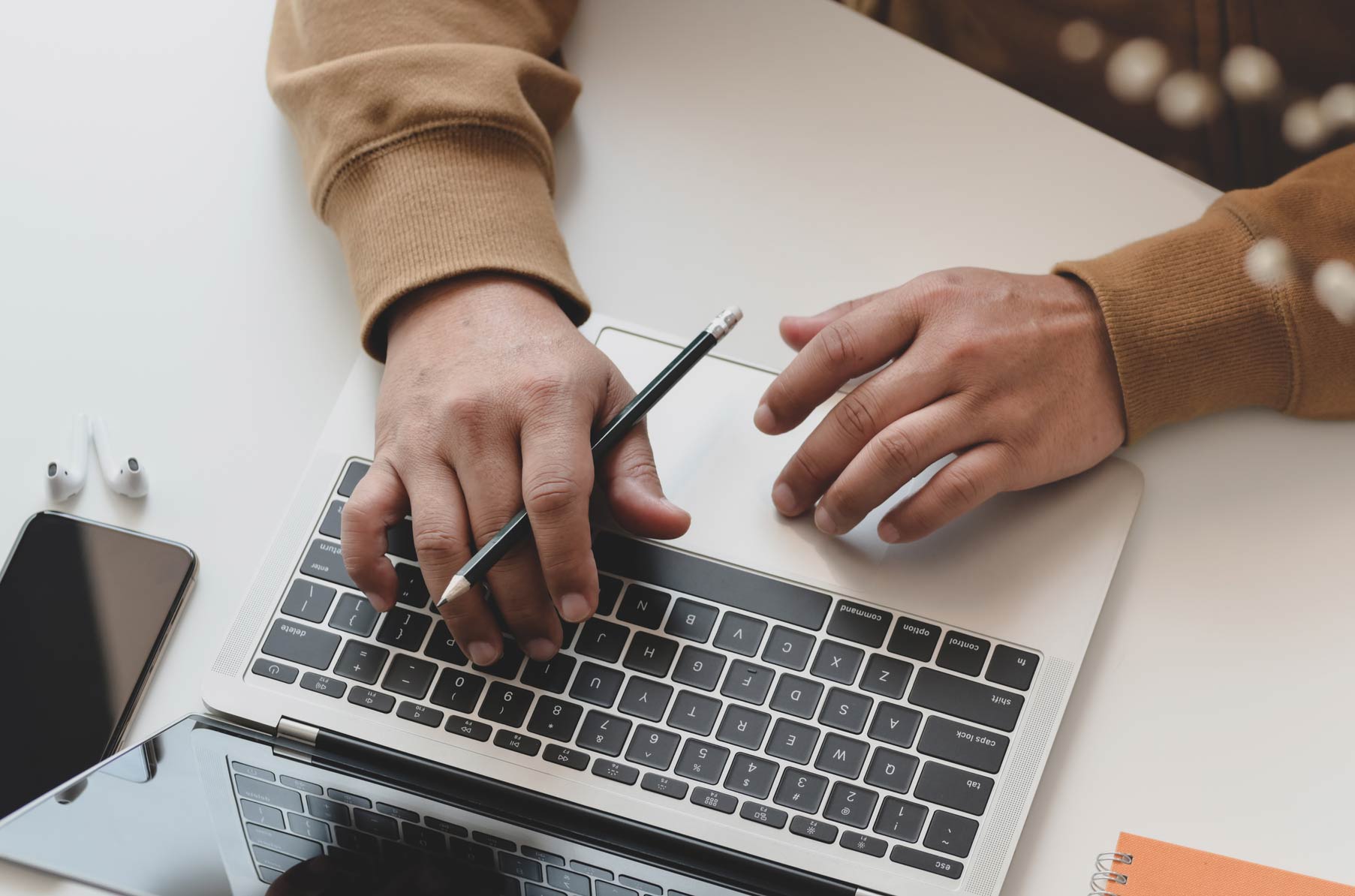 Man Typing On His Laptop — Royal Oak, MI — Melder & Melder, P.C.