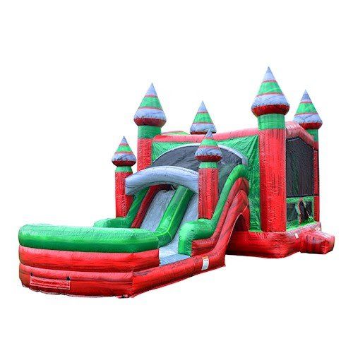A red and green bouncy castle with a water slide attached to it.