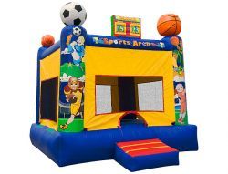 A bouncy house with a soccer ball and a basketball on top of it.