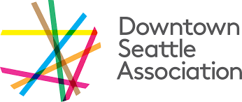 The logo for the downtown seattle association is a colorful star.
