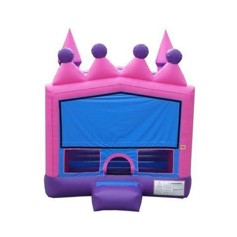 A pink and purple bouncy house with a crown on top of it.