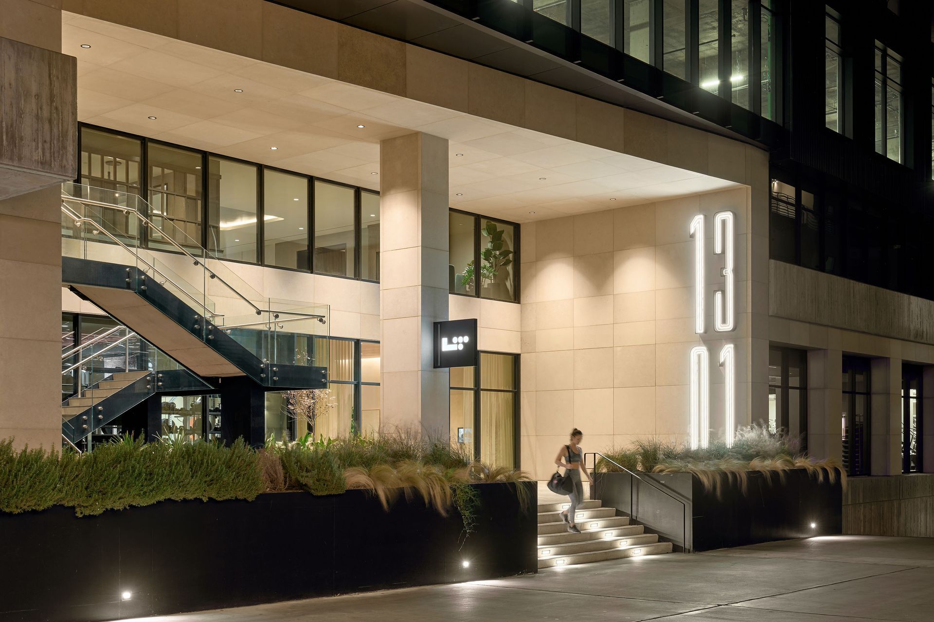 Building entrance at night with illuminated